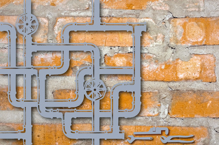 Element connection of water pipes and tools on a background of a brick wall in the form of a contour...