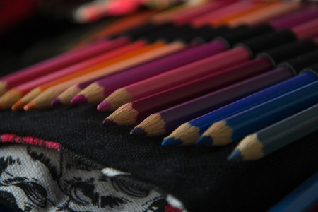 Colorful pencils in a row, multicolored spectrum image, selective focusの写真素材