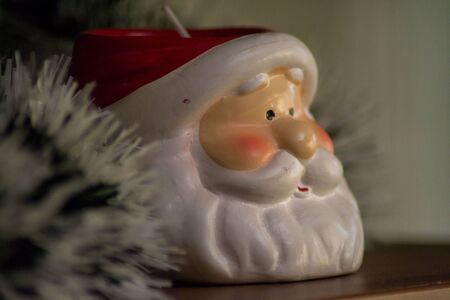 Christmas decoration- Santa candle, toy, ornament, holiday celebrationの写真素材