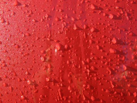 Detail of rain drops on a car door