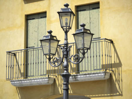 Old style streetlight and house facadeの写真素材