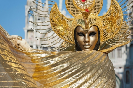 Venice, Italy - February 17, 2012: Mask posing in Saint Mark square, in front of Saint Mark Basilica, during famous Venetian Carnival celebrations. Shot in Venice, Italyのeditorial素材