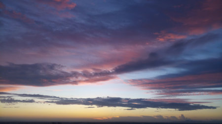 Beautiful purple, pink and yellow clouds, morning skies, seen atop Aliosha Hill (Bunardzhika Hill), in Plovdiv, Bulgaria, during Autumn. God is the best painter.の写真素材