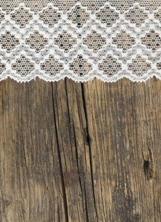 vintage lace on the wooden backgroundの写真素材