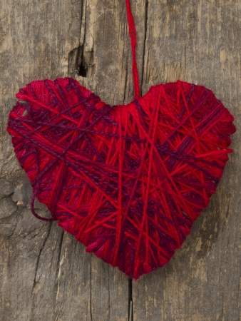 red heart on the wooden backgroundの写真素材