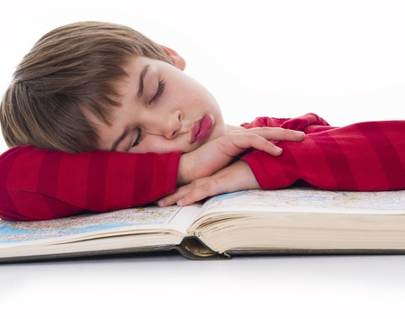 boy asleep on the book