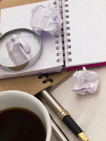 office arrangement with cup of coffeeの写真素材