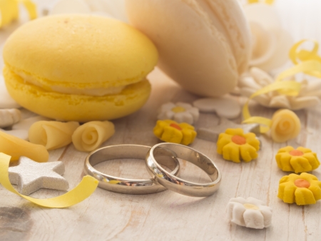wedding rings with macaroonsの写真素材