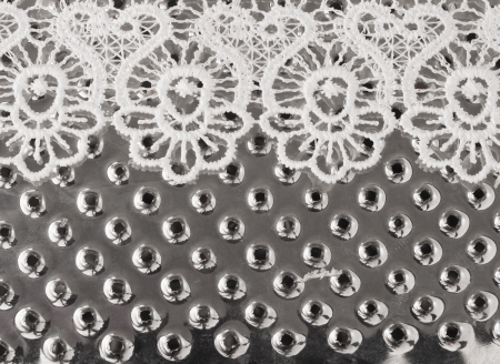 lace on the metal background