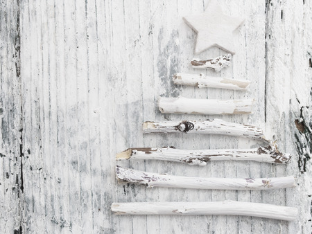 Xmas tree made of white, wooden branchesの写真素材
