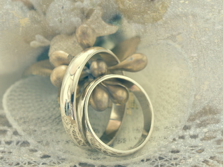 wedding rings in retro arrangementの写真素材