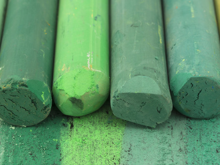 green artistic crayons