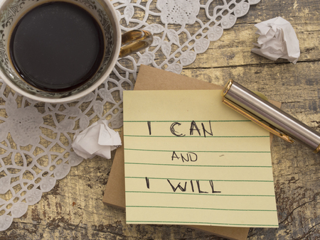 Motivation quote with cup of coffeeの写真素材