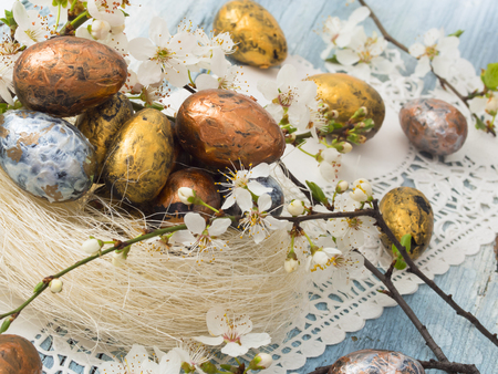 Easter eggs with spring decorationの写真素材
