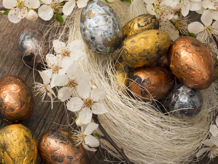 Easter eggs with spring decorationの写真素材