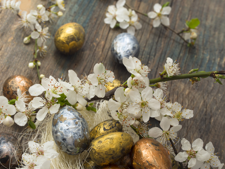 Easter eggs with spring decorationの写真素材