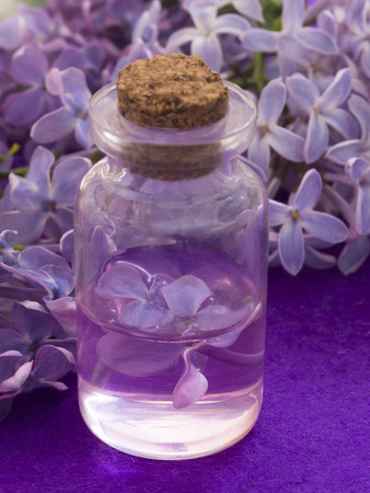 cosmetics with lilac flowersの写真素材
