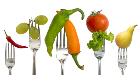 Diet Concept, vegetables and fruit on the forksの写真素材