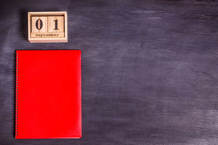 Various supplies for creativity and learning on a blue background with place for text. School...