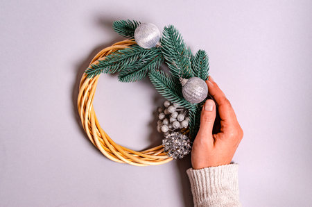 Template for a New Year card with gift boxes on a gray background with space for text. The concept of New Year and Christmas holidays, congratulations. copyspace. View from aboveの写真素材