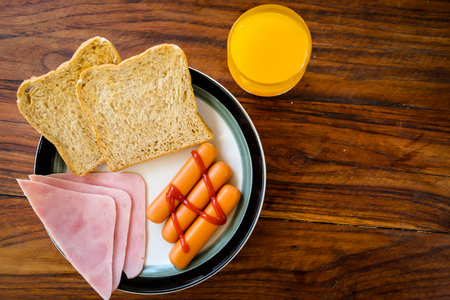 Breakfast of Ham,  Glass of Orange Juice and Toast close-up american breakfastの写真素材