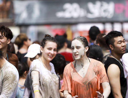 Female contestants at the mud festivalのeditorial素材