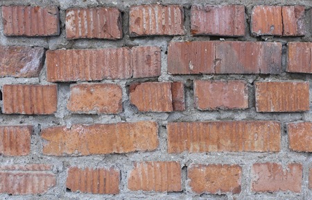 texture of a brick wall with red bricks