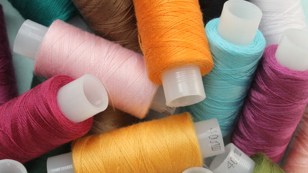 Coils with colored threads