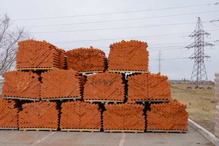 A large number of bricks. Wooden products on the construction market. The concept of a new house.の写真素材