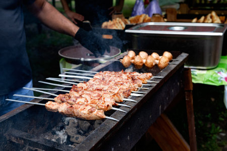 Tasty shish kebab cooking process. Grilled meatの写真素材