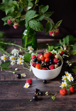 assorted organic fresh berries for a healthy dietの写真素材