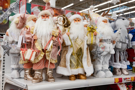 display of charming Santa figurines in blue, festive atmosphere, showcasing holiday spirit and...