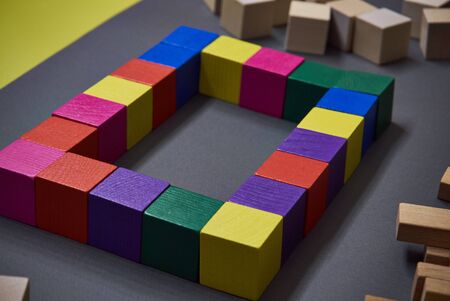 wooden colored cubes for home development, games
