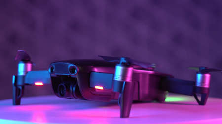 Moscow, Russia, 18 02 2020: DJI mavic air spins on white table. Drone footage close up ready to flight.のeditorial素材