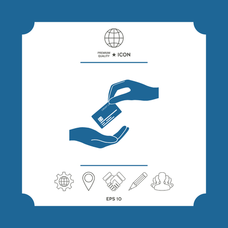 Receiving credit card. Hand holding credit card . Signs and symbols - graphic elements for your designのイラスト素材