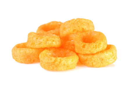 Stack of crispy onion rings on a white background