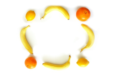 Lemon, bananas, orange photo frame isolated on whiteの写真素材