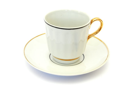 white cup of tea isolated on white background