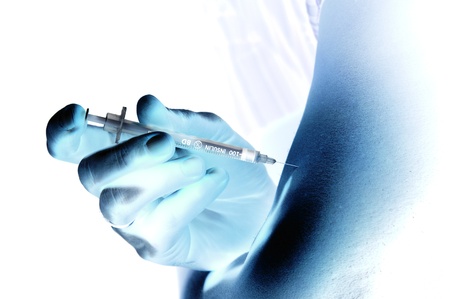 Shaded injection insulin pen at hand for healthの写真素材