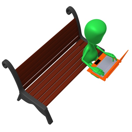 Over view puppet work after laptop on benchの写真素材