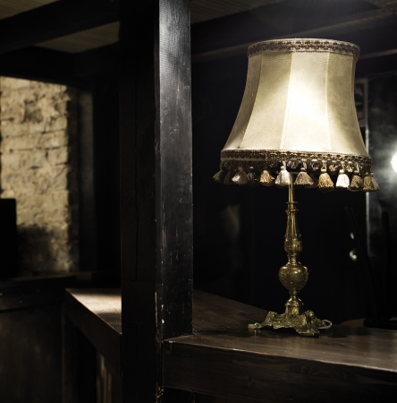 Old in retro style lamp lightning dark roomの写真素材