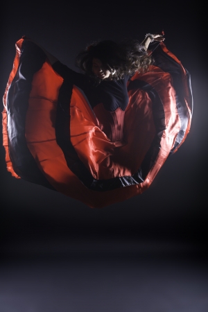 Young woman in spanish traditional clothes in airの写真素材