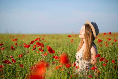 Young woman at white dress enjoy the aromaの写真素材