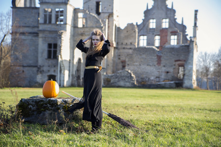 Witch with pale skin and pumpkin adjust hairの写真素材