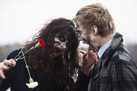 Creepy zombie got mad with the flowersの写真素材