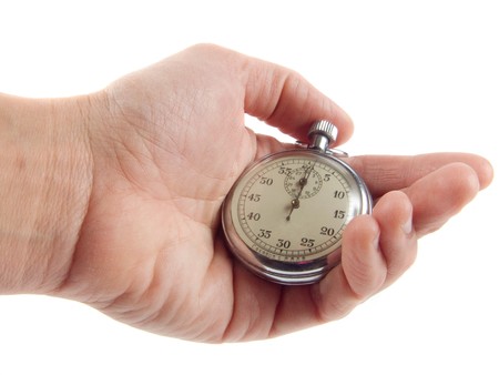 measurement instrument - a stopwatch on white backgroundの写真素材