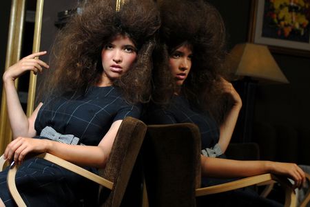 irl with messed hair in mirrorの写真素材