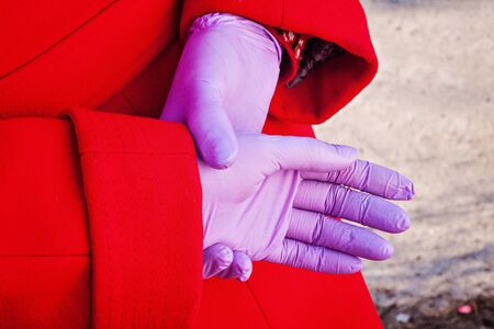 violet medical latex gloves covid virus protectionの写真素材