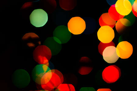 Evening defocused christmas lights boche black background bokehの写真素材