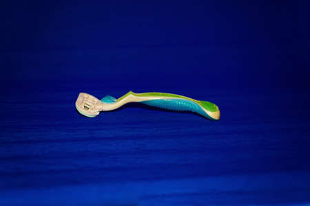 Womens razor on a blue backgroundの写真素材